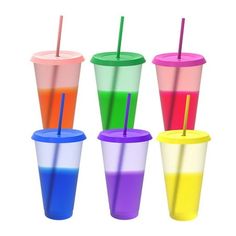 four different colored cups with straws in them