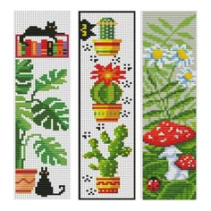 two cross stitch bookmarks with plants and cats