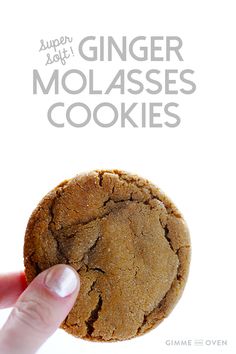 a hand holding a ginger molasses cookie over a white background with the title above it