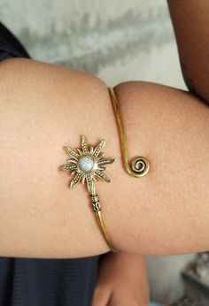 Moonstone Boho Upper Arm Bracelet, Gold Sunburst Arm Cuff, Goddess Bracelet, Spiral Arm Cuff, Gemstones Armlet, Sun Bohemian Jewelry Gift METAL :- Brass ❥ Customers satisfaction is our biggest priority, please contact us with any questions/queries for future or existing orders, and we will do our best to make sure you are happy with your order. ♥ Please Make Sure to Include The Correct Address During Before Order. You Can return Item within 30 Days After Successful Delivery. We Offer 100% Money Adjustable Bohemian Brass Cuff Bracelet, Bohemian Spiral Cuff Bracelet Gift, Bohemian Spiral Cuff Bracelet As Gift, Bohemian Spiral Hand Wrapped Bracelets, Bohemian Hand-wrapped Brass Cuff Bracelet, Handmade Bohemian Spiral Bracelets, Handmade Spiral Bohemian Bracelets, Bohemian Adjustable Spiral Jewelry, Handmade Bohemian Spiral Bracelet