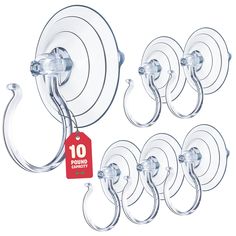 ten round glass hooks with red tag hanging from each hook on the wall, set of 10