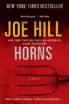 the cover of horns by joe hill is red and black with yellow writing on it