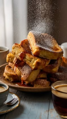 a pile of french toast sitting on top of a plate