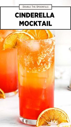 two glasses filled with an orange and red drink on top of a white countertop