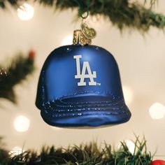 a baseball cap ornament hanging from a christmas tree