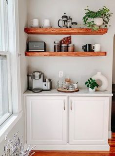 the kitchen is clean and ready to be used as a place for coffee or tea