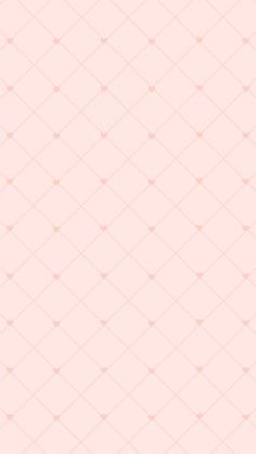 a pink wallpaper with small squares and dots in the middle, on top of it