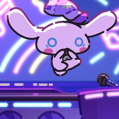 a cartoon bunny is in the air above a boombox with a microphone on it