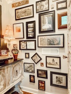 there are many framed pictures on the wall in this room, and it's easy to put together