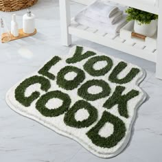 a bathroom rug with the words you cook on it