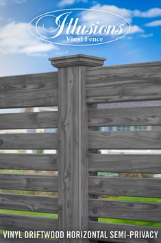 an advertisement for wood fence with blue sky and clouds in the background