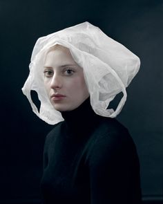 a woman wearing a plastic bag on her head