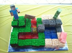 a cake made to look like a mineo train with grass and rocks on it