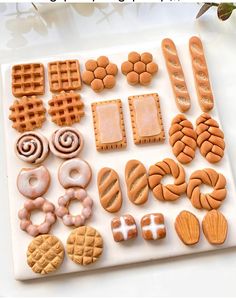 there are many different types of cookies on the tray