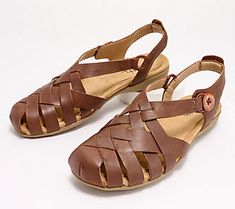 Top trend alert: The fisherman sandal is having a major moment! But, TBH, it's really never stepped out of style.  With its chic yet sensible design, Earth's slip-on is the perfect spring-to-summer-to-fall shoe. This breezy woven sandal offers caged coverage in just the right places (ideal when you're a week past your pedi appointment!), while memory foam cushioning and arch support provide supreme comfort for those all-day plans.   An absolute must-have for vacays on sandy shores, these leather Brown T-strap Sandals With Leather Footbed For Spring, Spring Brown T-strap Sandals With Leather Footbed, Brown Slip-on T-strap Sandals For Summer, Casual Summer T-strap Sandals With Leather Footbed, Casual T-strap Sandals With Rubber Sole For Spring, Casual Flat Heel T-strap Sandals For Spring, Brown Slip-on Slingback Sandals For Spring, Spring Comfortable T-strap Sandals With Round Toe, Comfortable Spring T-strap Sandals With Round Toe