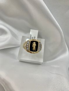 -14K San  Judas Ring  -100% Gold -Size 10.5  - Yellow gold  -Cubic zirconia  -Item sold by piece. Weight undetermined. Fine Jewelry Cubic Zirconia Signet Ring Stamped 14k, Diamond Signet Ring With 17 Jewels For Anniversary, Hallmarked Gold Signet Ring With Cubic Zirconia, Gold Hallmarked Cubic Zirconia Signet Ring, Gold Engraved Ring With Cubic Zirconia For Formal Occasions, Gold Cubic Zirconia Hallmarked Signet Ring, Collectible Gold Rings With Diamond Accents, Gold Cubic Zirconia Engraved Fine Jewelry Ring, Luxury Diamond Signet Ring Collectible