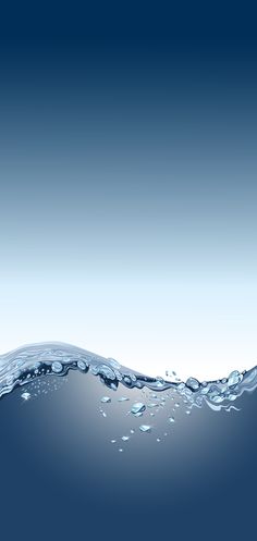 an ocean scene with water splashing on the surface and blue sky in the background