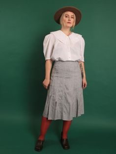 Vintage 90s linen cotton midi A-line skirt high waist with slits S/M, Light Academia skirt 30s 40s style - Gorgeous light gray 90s midi skirt that will be an excellent addition to a vintage inspired capsule wardrobe - Secretary, business, work, office, smart casual skirt - Similar to 30s and 40s style - Lined, high-waisted, zipper closure - 81% linen, 18% cotton, lining 100% acetate - Brand: - - Excellent vintage condition - Tag size -, estimated S/M, please see the exact measurements! ✿ MEASURE Classic Cotton Midi-length Bottoms, Vintage Cotton Midi Skirt, Classic Cotton Midi Skirt, Classic Midi Length Cotton Bottoms, Vintage Linen Skirt For Spring, Classic Midi Length Cotton Skirt, Vintage Spring Workwear Skirt, Vintage Summer Workwear Skirt, Vintage Skirt For Summer Workwear