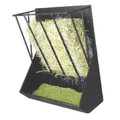 a hay feeder with grass in it on a white background and clippings attached to the sides