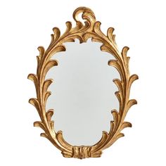 an ornate gold framed mirror on a white background