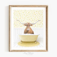 a cow with long horns sitting in a bathtub