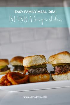 hamburger sliders on a plate with onion rings