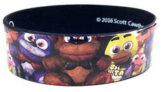 a close up of a wristband with cartoon characters on it