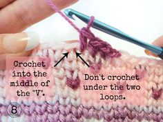 the crochet stitches are being used to knit the top part of an object