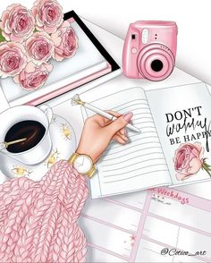 a person writing on a notebook with pink roses