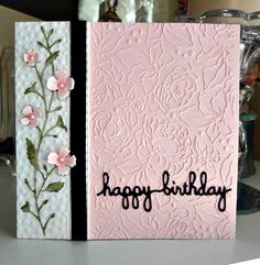 two cards with flowers on them and the words happy birthday written in black ink next to each other