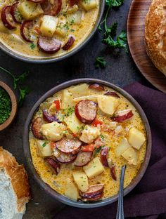 two bowls filled with food next to bread