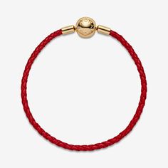 Add a little edge to your look with this woven red leather bracelet with a 14k gold-plated clasp, crafted from a unique blend of metals. The vibrant red hue provides the perfect backdrop for your selection of charms, especially when you want to stand out from the crowd. The bracelet looks wonderful worn solo, when styled with charms or when layered with your other favourite bracelets. Available in-store and online. | Pandora Moments Red Woven Leather Bracelet in 14k Gold-plated unique metal blen Pandora Leather Bracelet, Red Leather Bracelet, Pandora Red, Pandora Jewelry Charms, Multiple Bracelets, Charms Pandora, Bracelet Pandora, Woven Bracelet, Red Bracelets