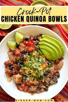 a white bowl filled with chicken quinoa bowls and topped with avocado