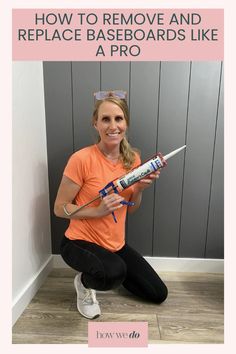 a woman sitting on the floor with a paint roller in her hand and text overlay that reads how to remove and replace baseboards like a pro