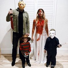 a family dressed up in costumes for halloween