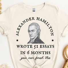 "Alexander Hamilton wrote 51 essays in 6 months, you can finish this" - This history teacher shirt makes a totally unique history teacher gift. Grab this tee today while it's on sale! Delivery Times: ◦ Production: 1 business day (avg.)  ◦ Shipping: 3 business days (avg.) Unisex Fit: ◦ Extra soft, preshrunk unisex t-shirt ◦ Women: Semi-fitted, laidback, rollable, & tuckable ◦ Men: Fitted on upper body & loose around the belly ☞ Size up for a looser fit Soft Materials: ◦ Super soft, preshrunk tee Teacher Outfits Big Bust, History Teacher Aesthetic, History Shirts, History Teacher, Funny Teacher Shirts, Social Studies Teacher Shirts, History Teacher Shirts, Funny History Shirts, English Teacher Shirts Funny