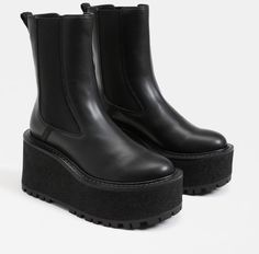 *THIS ITEM IS FINAL SALE* Color: Black Material: Vegan Leather A little rugged and cut out for blazing city streets, Susan's Chelsea boot styling and XL lug sole means business. Just add your favorite trousers or jeans and hit the sidewalk full strut ahead. Heel Height: 3.8 inchesPlatform Height: 2.5 inchesToe Type: Rounded ToeBoot Shaft: 4.5 inchesCalf Circumference: 10.2 inchesMaterial: SyntheticInsole: Synthetic Width: Medium Runs true to size FINAL SALE Susan Black, Boot Styling, Sneaker Heels Wedges, Kill Star, Edgy Looks, Black Platform Boots, Rounded Toe Boots, Swimwear Sets, Top Pants Set