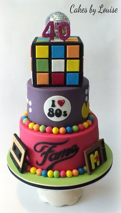 a cake that has been made to look like a rubikt cube on top