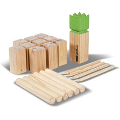 the wooden blocks and sticks are next to each other