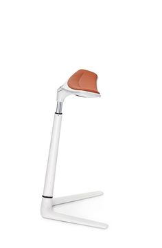 a white desk lamp with an orange light on it's head and the base