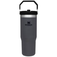 the stanley stainless steel water bottle with black lid and handle is shown on a white background