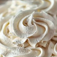 a close up view of some white frosting