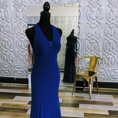 Simplicity At Its Finest. This Royal Blue Halter Gown Has A Mesh Inset For A Bit More Modesty. Elegant Stretch Blue Mermaid Dress, Blue V-neck Mermaid Dress For Prom, Blue Mermaid V-neck Dress For Prom, Blue Stretch Evening Dress For Prom, Blue Fitted Evening Dress For Homecoming, Blue Stretch Evening Dress, Blue Fitted Mermaid Evening Dress, Fitted Blue Mermaid Dress For Evening, Blue Evening Dress With Sweep Train For Night Out