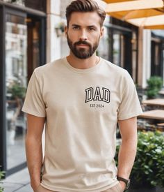 Discover the ultimate comfort and style with our "Dad Est 2024 Tshirt" collection. Crafted from soft, durable cotton, it's Perfect for fathers day, birthdays, Christmas, or any occasion that calls for a smile. 🎁 Why Choose Our shirt? - Stylish Design: Adds a touch of magic to your wardrobe. - Versatile: Ideal for birthdays, Father's Day, Christmas, or just because. - Premium Quality: Soft and crafted from top-notch materials for ultimate comfort. How to Get Yours: - Browse Options: Explore vari Dad Pregnancy Announcement, Tshirt Collection, Papa Shirts, Papa Shirt, Super Dad, Fathers Day Shirts, New Dads, Dad To Be Shirts, Gift For Dad