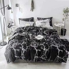 black and white bedding in a bedroom