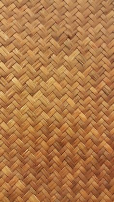 a close up view of a woven bamboo surface