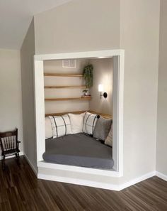 a small bed in the corner of a room