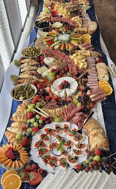 a long table filled with lots of different types of food