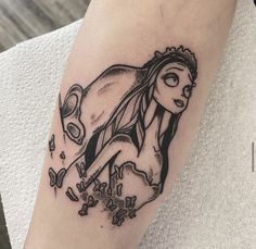 a woman's arm with a tattoo on it