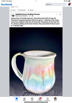 an instagramted photo of a coffee mug with rainbow swirls on the inside